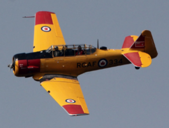 Tex Deagnon flying in Jim Hyrmack's Harvard Trainer Fairmont Hot Springs Tex Deagnon flying in Jim Hyrmack's Harvard Trainer Fairmont Hot Springs